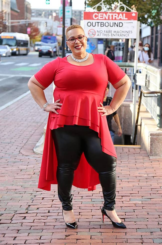 image of reviewer wearing the faux leather leggings
