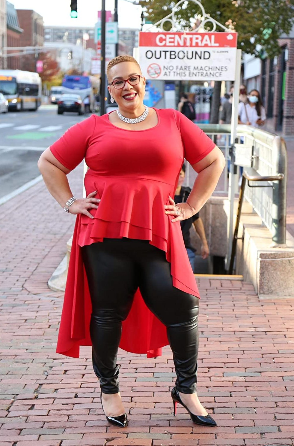 image of reviewer wearing the faux leather leggings