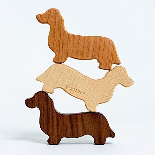 wooden rattles shaped like dogs