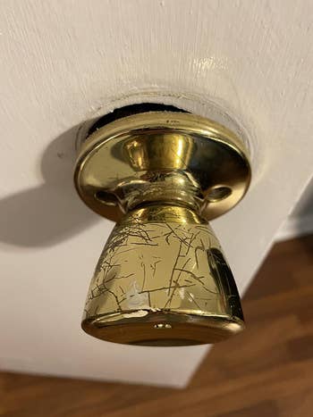 Social media trends Viral content Trending hashtags Social media updates Trending memes and videos reviewer before photo of scratched up brass doorknob
