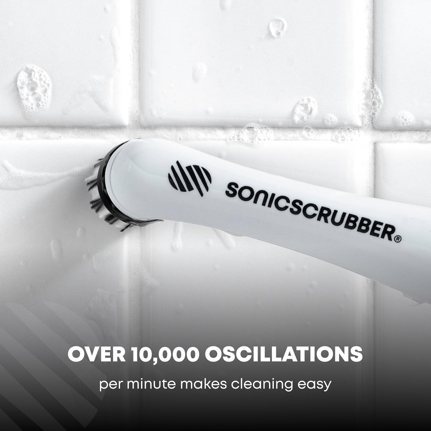 Electric cleaning brush scrubbing tile with text: 