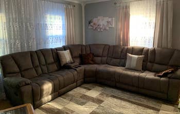 reviewer photo of gray microfiber reclining couch