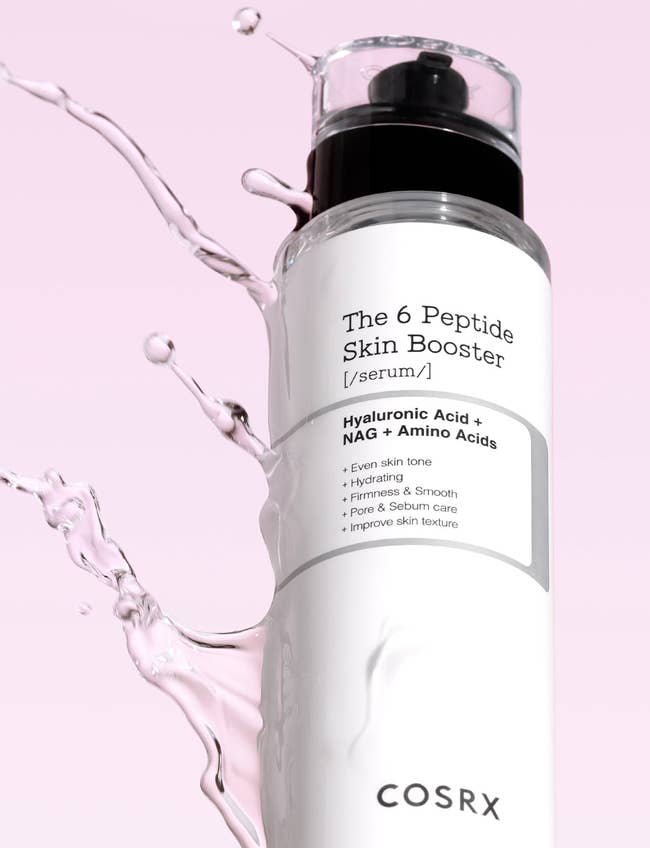 COSRX serum vessel with h2o splashes.