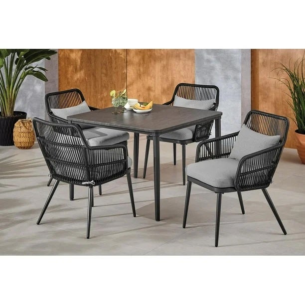 4 outdoor chairs around a table