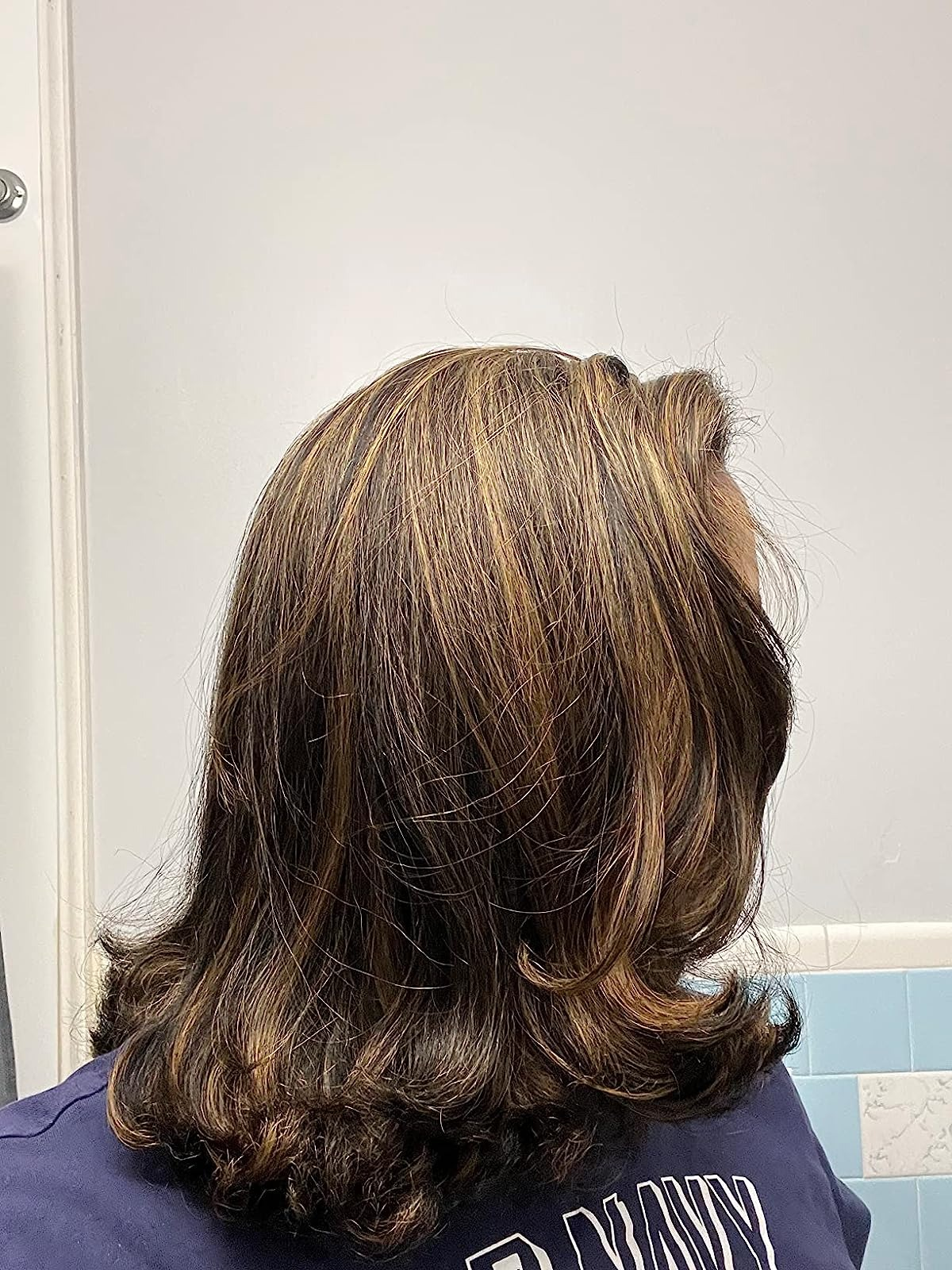 image of the same reviewer with dry, straight hair