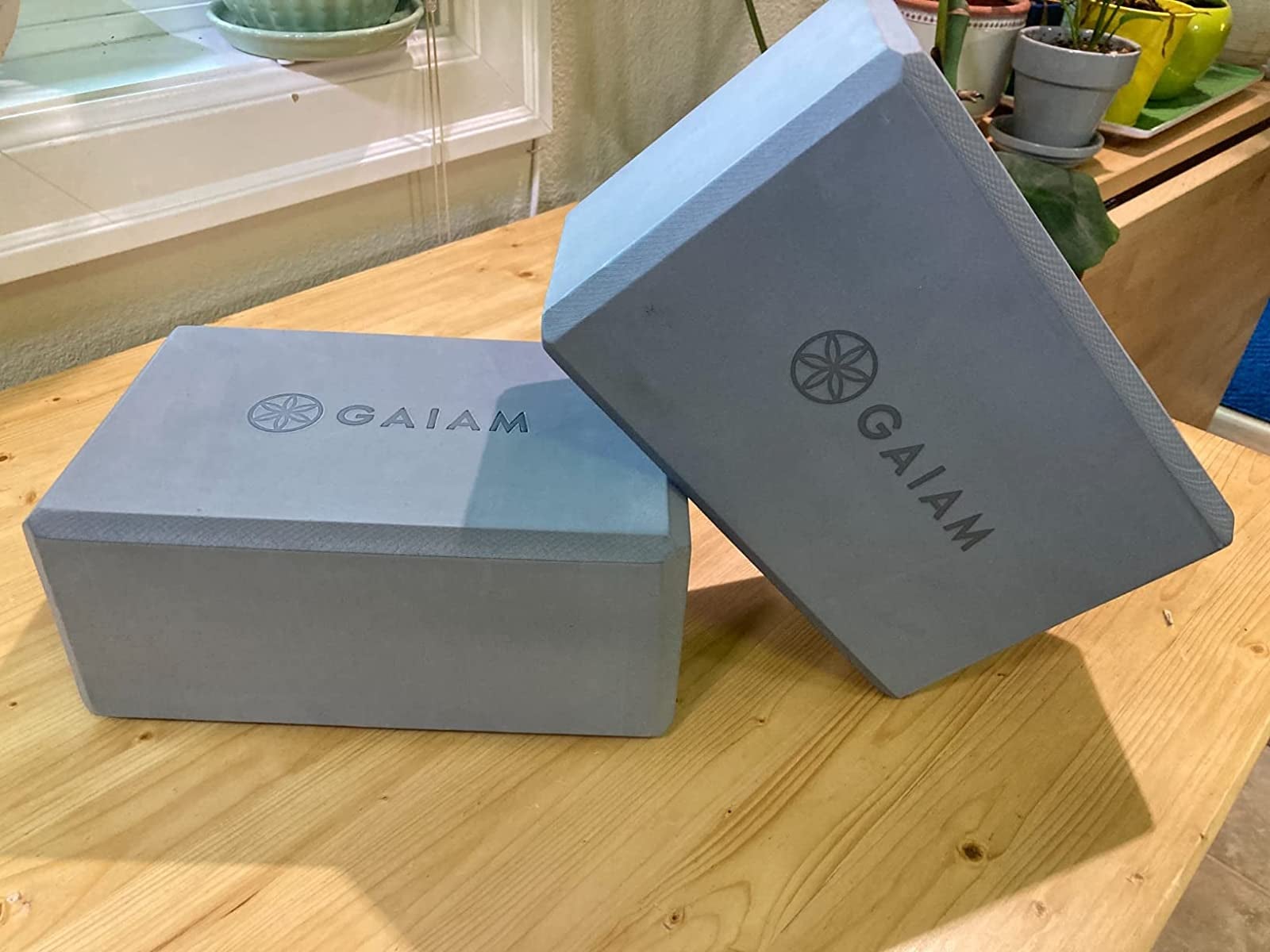 reviewer photo of their two gray yoga blocks