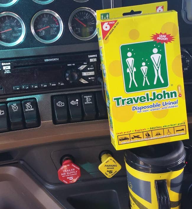 reviewer's pack of TravelJohns in the car