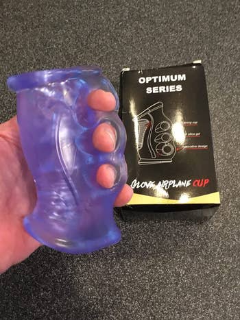 Reviewer holding stroker by finger grips