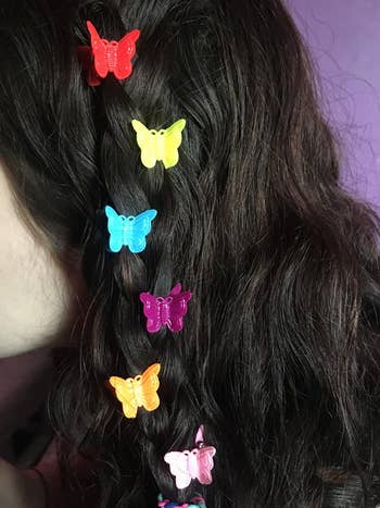 reviewer photo with butterfly clips in vertical line down hair