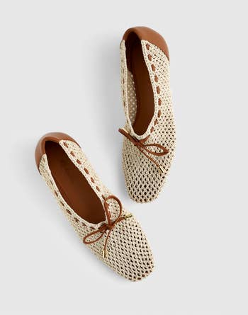 Woven slip-on shoes with leather trim and brownish laces, suitable for casual wear