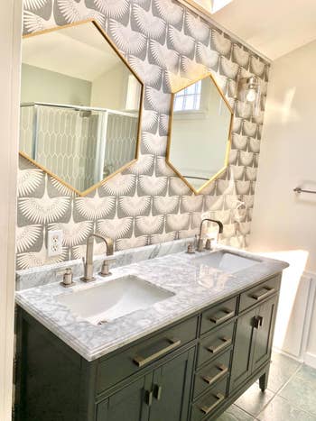reviewer photo of bathroom vanity wall decorated with the chalk wallpaper