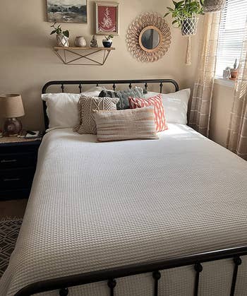 reviewer photo of the white duvet cover on a bed