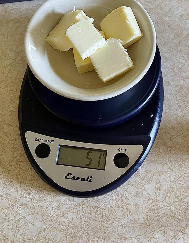 reviewer's scale measuring 51 grams of butter