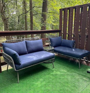 another reviewer's navy sofa chase sectional and small side table in between the two pieces