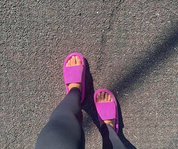 reviewer wearing the pink slides