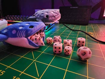 whale shark purse spitting out dice 