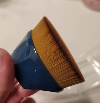 A reviewer's foundation brush, side view
