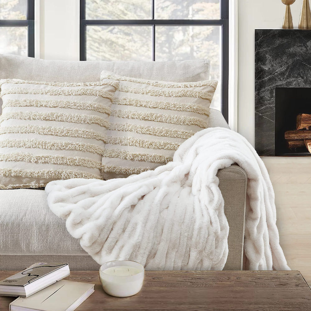The blanket thrown over a couch