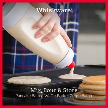 A model pouring out batter from the Whiskware Pancake Batter Mixer with BlenderBall Wire Whisk