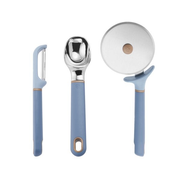 A light blue vegetable peeler, ice cream scoop, and pizza cutter