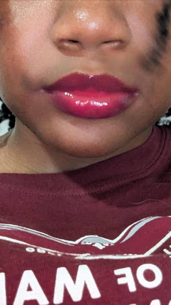 Close-up of reviewer's lips wearing lip oil