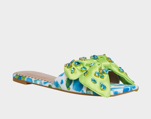 slide sandals in blue and white spot print with large green bow with blue jewels
