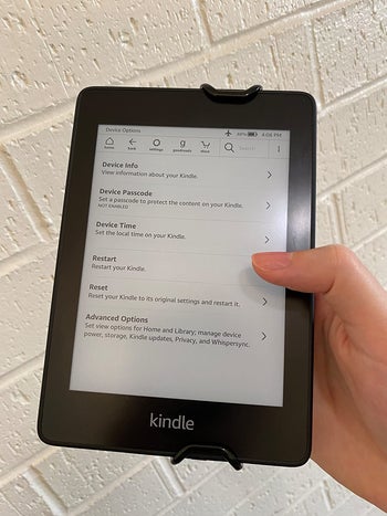 front view of the kindle with the strap on
