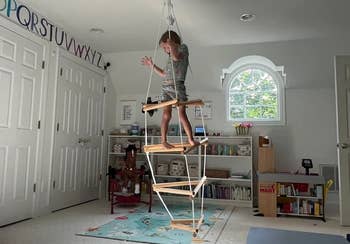 Reviewer's photo of a child climbing the rope ladder