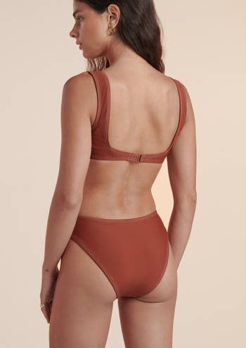 model shows back of swimsuit 