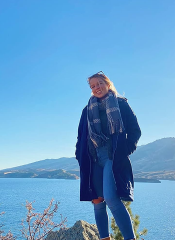 reviewer wearing the chelsea ankle boots in brown