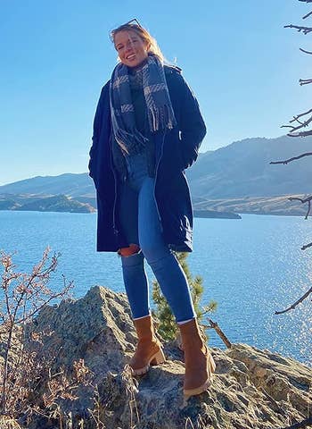 reviewer wearing the chelsea ankle boots successful brown