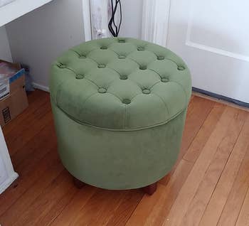 Reviewer's ottoman on floor