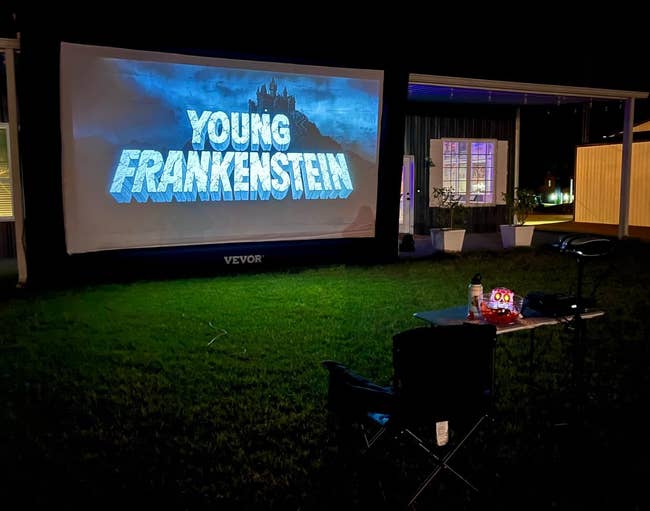Outdoor movie setup showing