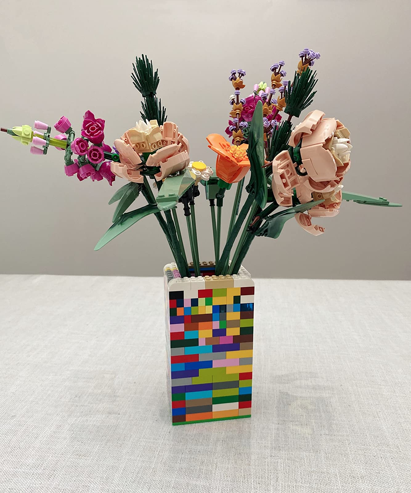 the residing of lego plant life internal a lego-shaped vase