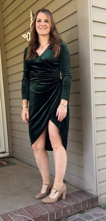 another reviewer wearing the dress in green