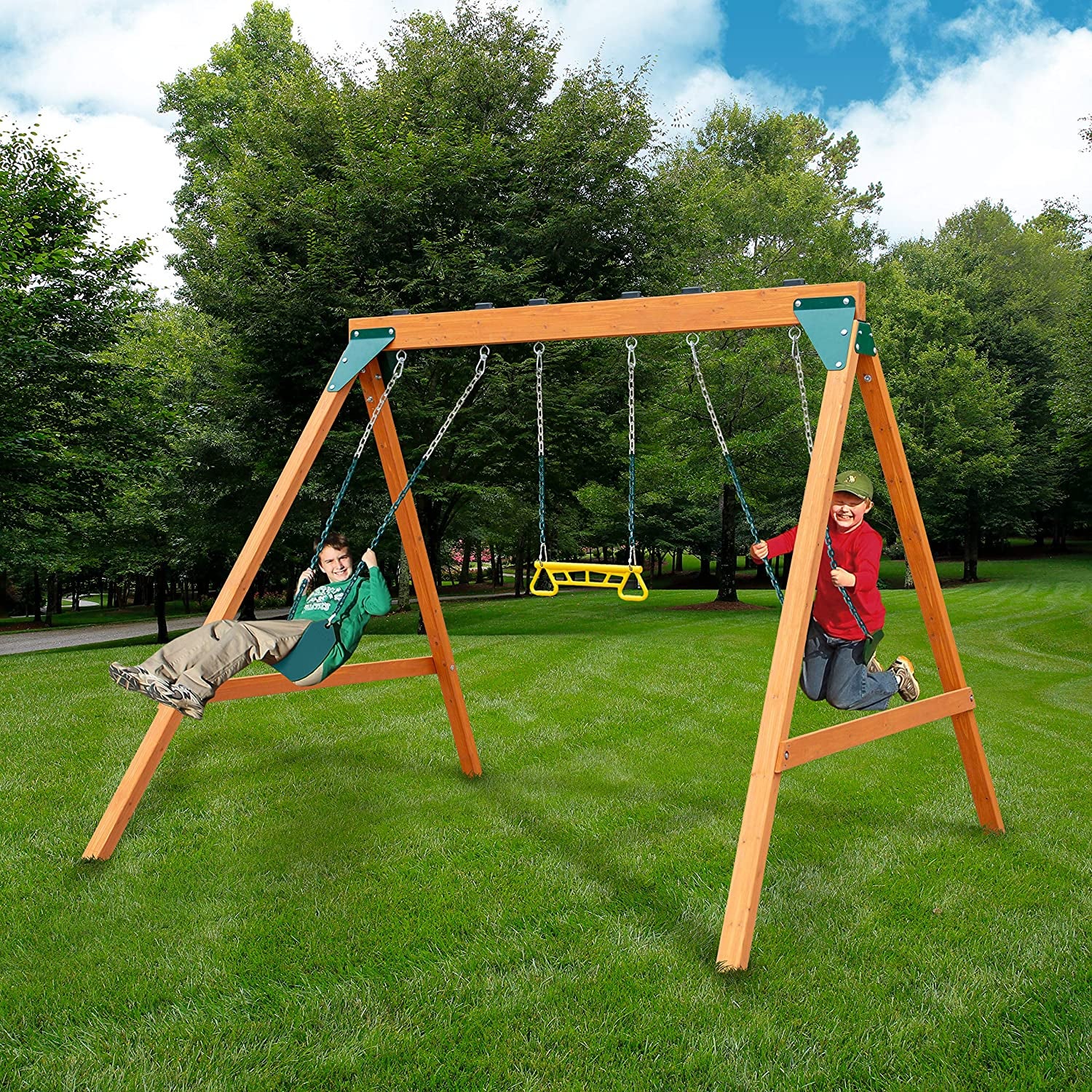 two kids swinging on a wooden swing set with a yellow acrobat bar in the middle