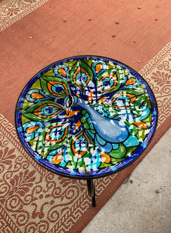 another reviewer showing close up of their peacock stained glass table