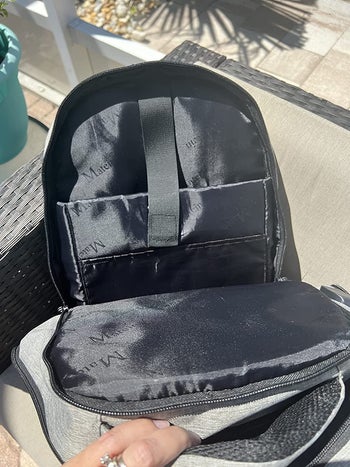Reviewer photo showing inside compartments of backpack