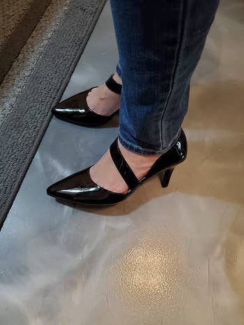 reviewer wearing the black pumps