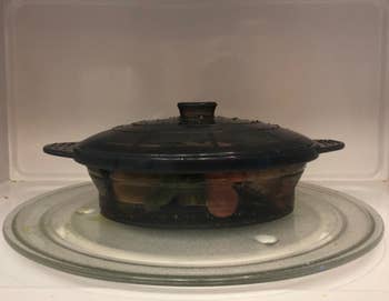 a reviewer photo of the steamer bowl in the microwave 
