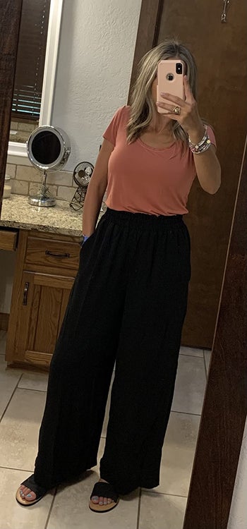 reviewer mirror selfie wearing black palazzo pants