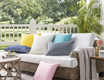 an array of weatherproof throw pillows