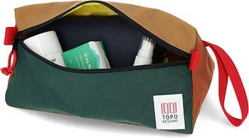 green and brown open dopp kit