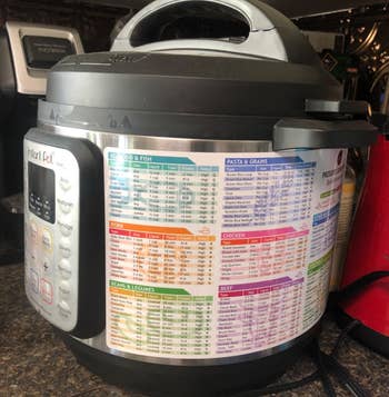 reviewer's Instant Pot Magnetic Cheat Sheet Set on the pressure cooker
