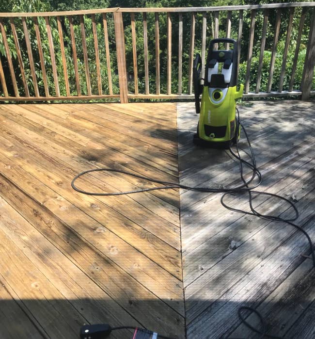 reviewer image of a deck being washed with half of it looking gray and dull, and the other half cleaned