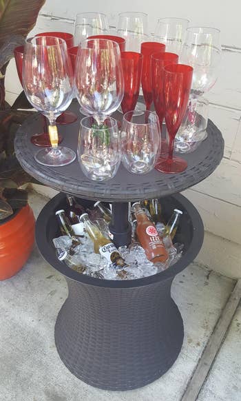Reviewer image o the side table with ice and drinks inside it