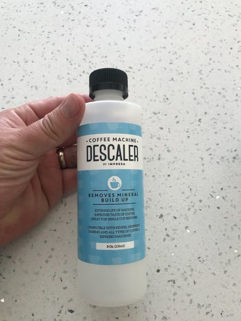 reviewer image of the bottle of descaler solution