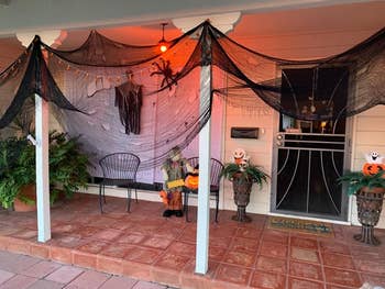 the black cloth draped across the top of a reviewer's porch