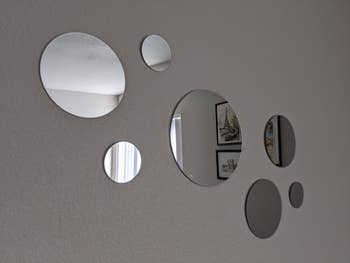 reviewer image of the circle mirrors on a wall