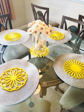 the yellow trivet mats arrnaged on a table